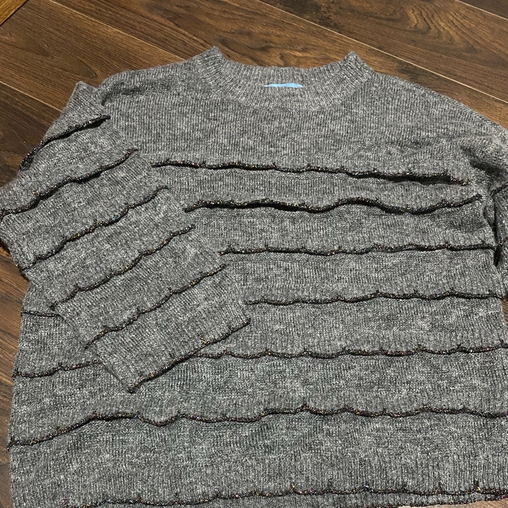 Grey sweater with multiple colour detailing